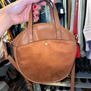 Tan round style purse
